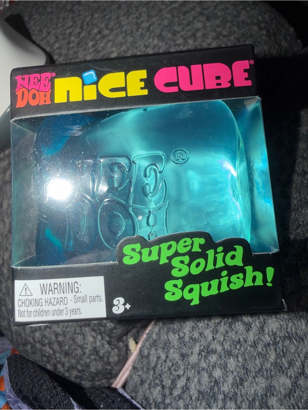 Nee Doh Nice Cube fidget toy in purple or blue